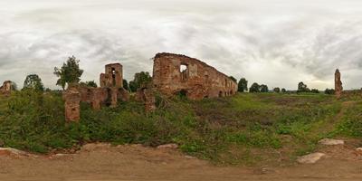 Full 360 by 180 panorama in equirectangular spherical equidistant projection in ruined medieval castle. Skybox for photorealistic VR content photo