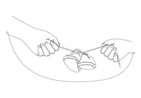 Continuous line of mother's hand holding baby's shoes vector