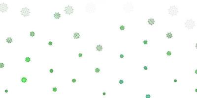 textura de vector verde claro con copos de nieve brillantes.