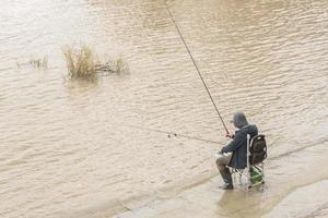 fisherman on the river photo