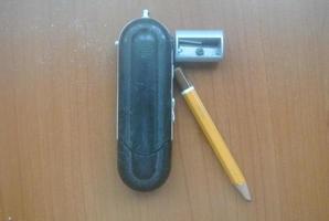 pencil, usb stick and a razor photo