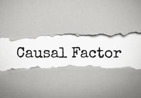 causal factor words on torn paper. business concept photo