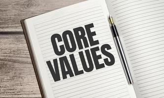 core values text on notepad with pen, business concept photo