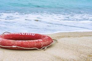 Lifebuoy on the beach photo