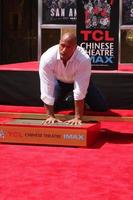 LOS ANGELES, MAY 19 - Dwayne Johnson, The Rock at the Dwayne Johnson Hand and Foot Print Ceremony at the TCL Chinese Theater on May 19, 2015 in Los Angeles, CA photo