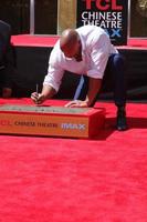 LOS ANGELES, MAY 19 - Dwayne Johnson, The Rock at the Dwayne Johnson Hand and Foot Print Ceremony at the TCL Chinese Theater on May 19, 2015 in Los Angeles, CA photo