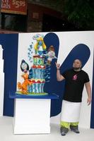 LOS ANGELES, JUL 28 - Duff Goldman with the Smurfs 2 cake by Charm City Cakes arrives at the Smurfs 2 Premiere at the Village Theater on July 28, 2013 in Westwood, CA photo