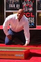 LOS ANGELES, MAY 19 - Dwayne Johnson, The Rock at the Dwayne Johnson Hand and Foot Print Ceremony at the TCL Chinese Theater on May 19, 2015 in Los Angeles, CA photo