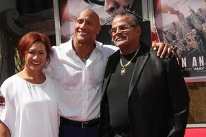 LOS ANGELES, MAY 19 - Ata Johnson, Dwayne Johnson, Rocky Johnson at the Dwayne Johnson Hand and Foot Print Ceremony at the TCL Chinese Theater on May 19, 2015 in Los Angeles, CA photo