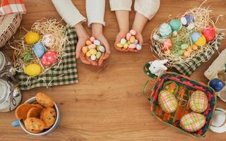 Two people. Happy little sister and brother celebrating Easter holidays together photo