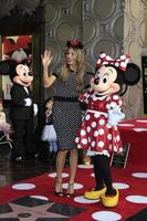 LOS ANGELES   JAN 22 - Mickey Mouse, Heidi Klum, Minnie Mouse at the Minnie Mouse Star Ceremony on the Hollywood Walk of Fame on January 22, 2018 in Hollywood, CA photo