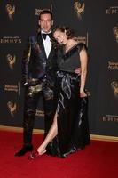 LOS ANGELES SEP 9 - John Roberts, Kristen Schaal at the 2017 Creative Emmy Awards at the Microsoft Theater on September 9, 2017 in Los Angeles, CA photo