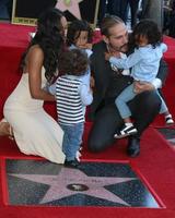 LOS ANGELES  MAY 3 - Zoe Saldana, Marco Perego, sons at the Zoe Saldana Star Ceremony on the Hollywood Walk of Fame on May 3, 2018 in Los Angeles, CA photo