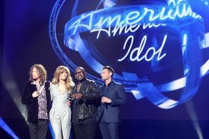 LOS ANGELES  SEP 22 - Stephen Tyler, Jennifer Lopez, Randy Jackson, Ryan Seacrest at the American Idol Season 10 Judges Announcement at Forum on September 22, 2010 in Ingelwood, CA photo