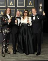 LOS ANGELES - MAR 27  Jared Bush, Byron Howard, Yvett Merino, Clark Spencer at the 94th Academy Awards at Dolby Theater on March 27, 2022 in Los Angeles, CA photo