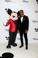 LOS ANGELES   OCT 6 - Mickey Mouse, Leslie Odom Jr at the Mickey s 90th Spectacular Taping at the Shrine Auditorium on October 6, 2018 in Los Angeles, CA photo