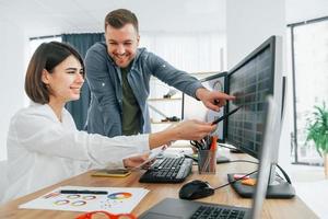 Set of different colors. Two designers working together in the office photo