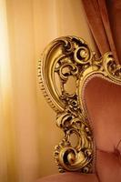 Vintage detail of interior living room in baroque and rococo style photo