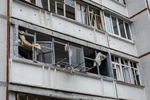 KHARKIV, UKRAINE - May, 04, 2022. War in Ukraine 2022. Destroyed, bombed and burned residential building after Russian missiles in Kharkiv Ukraine. Russian aggression. Russian attack on Ukraine. photo