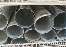Rolls of flat galvanized metal sheets. photo