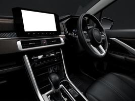 Inside the luxury car steering wheel, gear lever and dashboard. photo