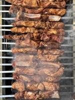 barbecue grill - top view. coal skewer meat. fry meat outdoors. dinner photo