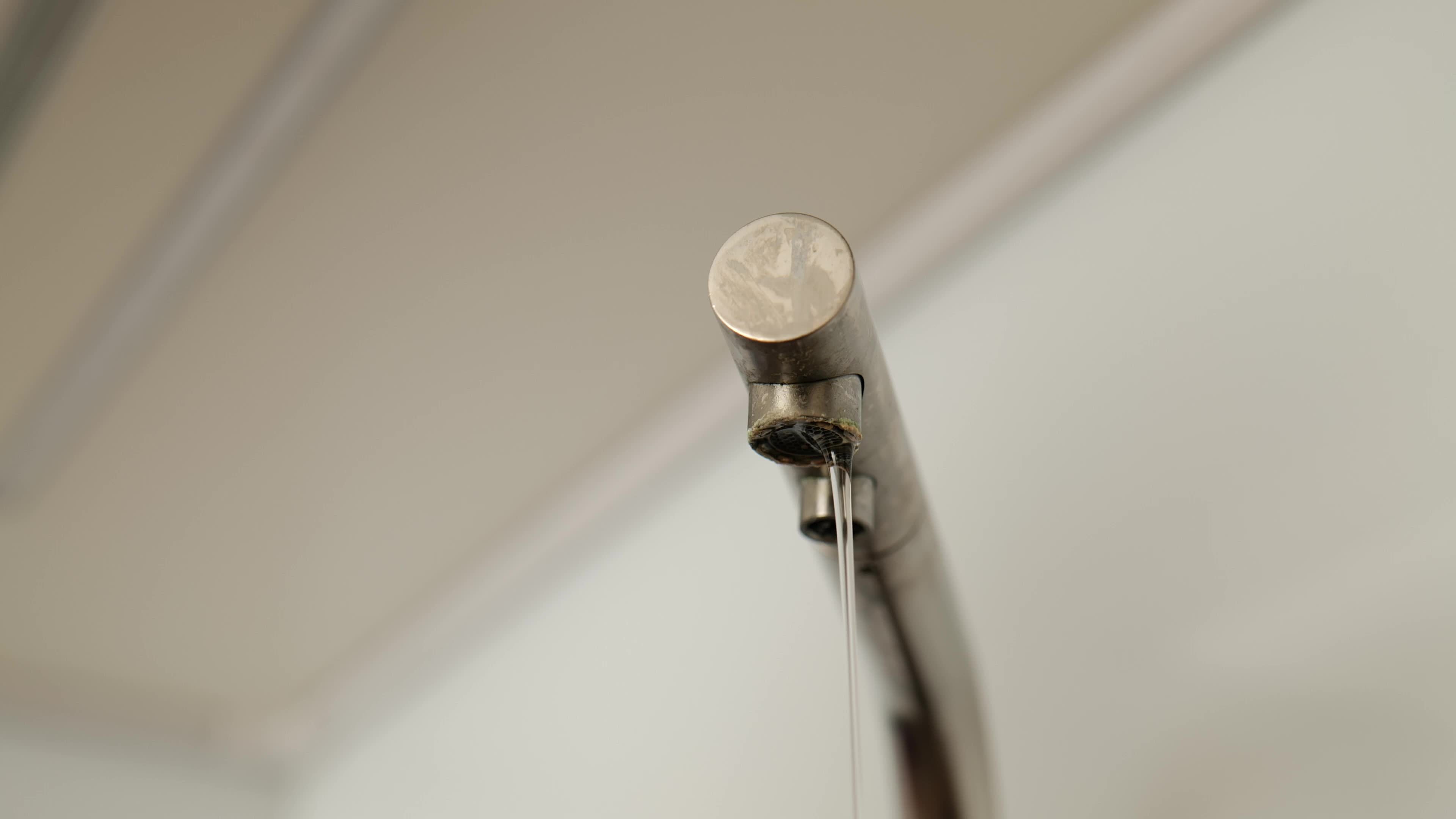 tap water flows slowly 8245887 Stock Video at Vecteezy