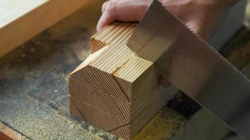 woodworker cuts wood blanks with a Japanese saw video