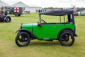 Goodwood, West Sussex, UK, 2012. Austin Seven Parked on the Airfield at the Goodwood Revival photo