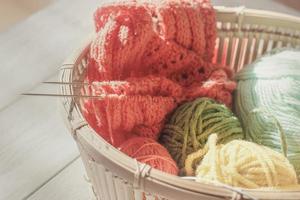 knitting yarn, needles, skeins of yarn. spring colors for knitting. photo