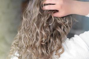 teenage girl with natural wavy hair photo