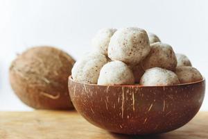 coconut energy balls with almond. healthy sugar free concept. keto diet recipe. photo