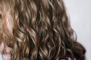 teenage girl with natural wavy hair photo