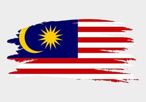 Flag of Malaysia. Brush painted Flag of Malaysia. Hand drawn style illustration with a grunge effect and watercolor. Flag of Malaysia with grunge texture. Vector illustration.