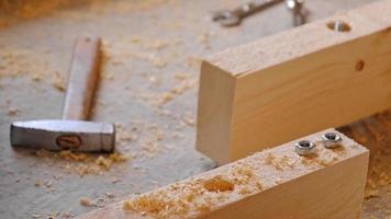 Installation of a wooden floor log on studs.Rough floor on the concrete floor of the house, repair of the house with your own hands, diy. Slow motion video