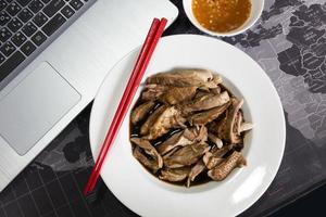 Boiled, stewed duck on the table photo