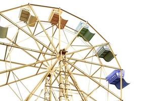 Ferris wheel with colorful seats, yellow steel frame, set in the park for children to play and relax on a white background. photo