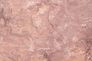Red sandstone is a large stone used for landscaping, decorating the garden to look natural with man-made and many patterns on the surface. photo