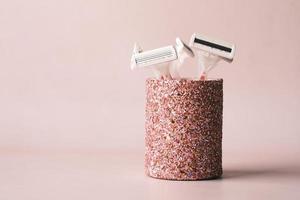 close up of pink color razor on table , photo