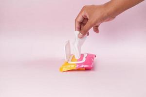 Cleansing wet wipes on table with copy space photo