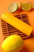 Close up of sunscreen cream in a orange container photo