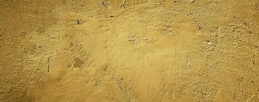 yellow texture cement concrete wall abstract background photo