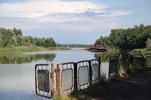 Lake in Pripyat in Chernobyl Exclusion Zone, Ukraine photo