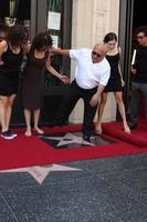 LOS ANGELES, AUG 18 - Danny Devito, with Wife Rhea Perlman, and their children at the ceremony as Danny DeVito Receives a Star at Hollywood Walk of Fame on the August 18, 2011 in Los Angeles, CA photo