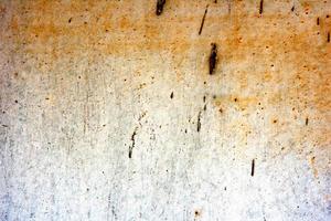 Metal texture with scratches and cracks which can be used as a background photo