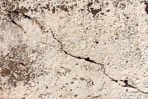 Old grunge crack gray concrete wall texture background photo