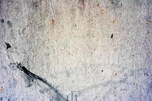 Metal texture with scratches and cracks which can be used as a background photo