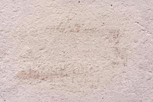 textura de una pared de hormigón con grietas y arañazos que se pueden utilizar como fondo foto