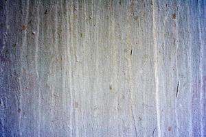 Metal texture with scratches and cracks which can be used as a background photo