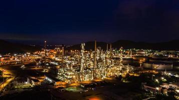 Oil refinery industry at night photo